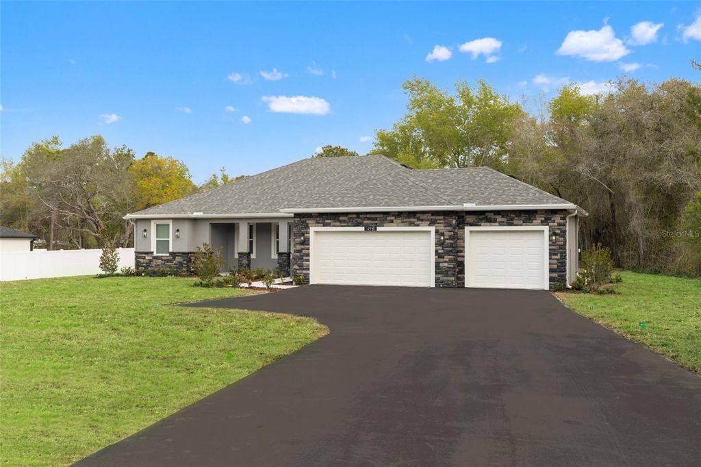 Photo of 14981 Peace Boulevard, Spring Hill, FL 34610 (MLS # W7884301)