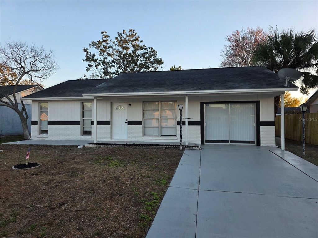 Photo of 7502 Jenner Avenue, New Port Richey, FL 34655 (MLS # TB8474629)