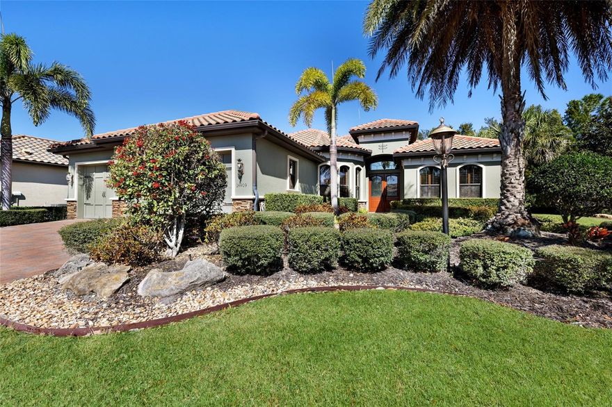 Set on nearly a half acre at the end of a quiet cul-de-sac with no homes on one side, this custom residence in a maintenance free neighborhood in Country Club East offers privacy, quality craftsmanship, and refined comfort throughout. Built with hurricane-impact windows and doors, the home features three bedrooms plus a private office complete with a walk-in storage closet. Rich wood flooring, plantation shutters, tray ceilings, crown moldings, architectural details and custom built-ins add warmth and character throughout. The kitchen serves as the true heart of this home, a Cook’s delight. It showcases double built-in Viking wall ovens, a  6 burner Viking gas cooktop, built-in Viking microwave and warming drawer. The center island has its own prep sink with a breakfast bar that also provides seating to converse with the cook.  The walk in  pantry provides extensive storage as well as an appliance counter and drawers for baking supplies.   The dinette is framed by an aquarium window. The primary suite is a peaceful retreat with a tray ceiling, double glass doors opening to the lanai, two custom-organized walk-in closets, and a spacious en suite bath featuring dual vanities,  a walk-in shower, private water closet, and linen closet. One guest bedroom includes a built-in Murphy bed and an en suite bath, while the second guest room offers pocket slider access to the pool and lanai. Outdoor living is equally impressive with a private pool, spa, and fully equipped outdoor kitchen, creating seamless indoor-outdoor enjoyment. The home also offers a three-car garage and an exquisite laundry room with a utility sink, marble counters and beautiful cabinetry. Secret Harbor is an exclusive enclave within Country Club East offering maintenance-free living. Residents of Country Club East enjoy access to The Retreat fitness center and resort-style pool, and the Lakewood Ranch Golf & Country Club offers several levels of optional membership.