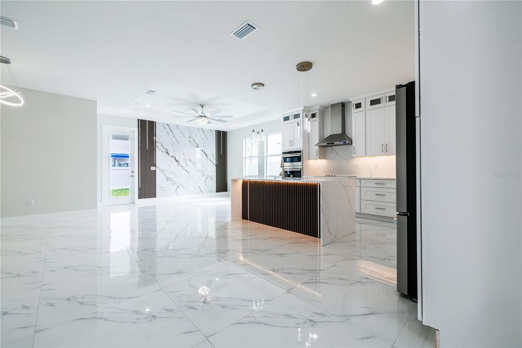 Photo of 3803 W Palmetto Street, Tampa, FL 33607 (MLS # TB8487931)