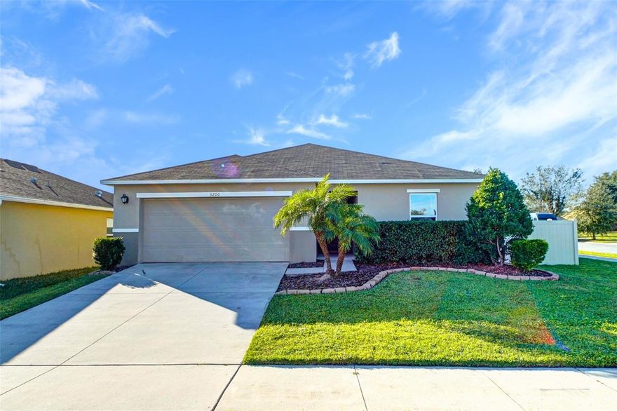 Beautifully 4-bedroom, 2-bath home built in 2020, ideally positioned on a desirable corner lot in the Casa Bella community of Kissimmee. This property features an inviting open-concept layout with elegant wood-look tile flooring throughout the main living areas and carpet in bedrooms, offering comfort and style.

The kitchen includes granite countertops, stainless steel appliances, wood cabinetry, a breakfast bar, and a stylish tile backsplash perfect for cooking and entertaining. The living and dining areas receive abundant natural light, creating a warm and welcoming atmosphere.

The master bedroom features a spacious layout with a double-sink vanity and excellent storage. Step outside to enjoy a covered back porch ideal for relaxing, along with a fully fenced backyard that offers privacy and room for outdoor enjoyment.

This home provides convenient access to major highways, schools, shopping, restaurants, medical facilities, and local attractions. Don’t miss the opportunity to make this wonderful property yours schedule your showing today!