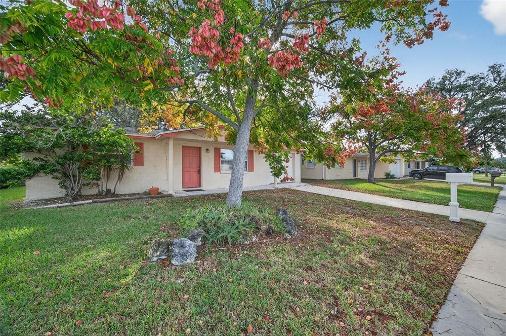 Photo of 10102 Glen Moor Lane, Port Richey, FL 34668 (MLS # TB8442938)