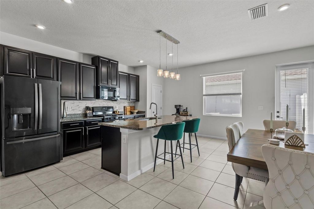 Photo of 15416 Caravan Avenue, Odessa, FL 33556 (MLS # TB8474520)