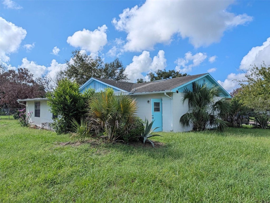 Photo of 5379 Fox Briar Trail, Orlando, FL 32808 (MLS # O6443656)