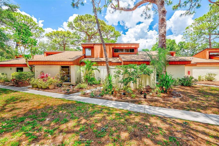 BEAUTIFULLY UPDATED, SPACIOUS CONDO featuring 3 Bedrooms and 2 FULL Baths, SPLIT PLAN boasting nearly 1,500 SF!  FANTASTIC LOCATION is within 15 minutes to CLEARWATER BEACH!!  WOODLAKE is an ALL AGES, PET FRIENDLY community! TWO DOGS allowed, breed restrictions apply. This TOWNHOME style condo enjoys a FIRST FLOOR PRIMARY BEDROOM that can easily fit a King size bed and features a LARGE WALK-IN CLOSET, ceiling fan, and sliding glass door access to the covered private patio and a stylish FULL Bath.  Upstairs are TWO ample sized bedrooms each with ceiling fans, ample closet space, large bright windows and convenient hall bath. Love some outdoor space and PRIVACY that’s hard to find in a condo community?  There are TWO PORCHES - one is COVERED located in the rear off the living room and has NEW PVC FENCING with generous space for gardening and the other patio is in the front surrounded by LUSH MATURE LANDSCAPING, a perfect spot for morning coffee.  Spacious living room has stunning VAULTED HIGH CEILINGS, ceiling fans and glass sliding doors to access the patio that bring in an abundance of natural lighting! Gorgeous NEW wood look TILE FLOORING engulfs the main living areas and NEW LVP Flooring traverses the stairway to the 2nd floor bedrooms. Many bright windows let in light and nature views here that don’t disappoint the nature lover! The KITCHEN has been UPDATED and has beautiful GRANITE counter tops and BACKSPLASH, ample counter space and cabinetry for the chef of the home and flows easily to the dining area through the expanded opening.  A desired feature is the HUGE inside LAUNDRY ROOM for additional storage needs plus an abundance of items can be stored in the closet under the stairway! The AC SYSTEM IS NEW 2021 with UV LIGHT, recently Cleaned and Sanitized Ductwork!  NEWER TANKLESS HOT WATER HEATER is a space and energy saver featuring on demand hot water.  NEW ROOF 2022, BOTH Baths have UPDATED TILES, VANITIES AND TOILETS.  Woodlake condos is in the heart of Clearwater.  Close to many shops, restaurants, Publix, Sunset Grill, Queens Greek Restaurant, Chase Bank, Countryside Mall, Dunedin’s quaint downtown, Honeymoon Island, Tampa Airport, Blue Jays Spring Training Baseball, and of course CLEARWATER BEACH. Residents enjoy well maintained lush landscaping and amenities such as the beautiful refreshing POOL and Tennis Courts. Have peace of mind knowing you are in a NO FLOOD ZONE!  Homes here do not stay on the market long so make an appointment to see it soon!