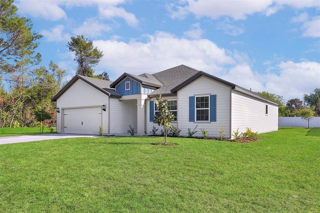 Photo of 3 Fielding Lane, Palm Coast, FL 32137 (MLS # TB8422011)