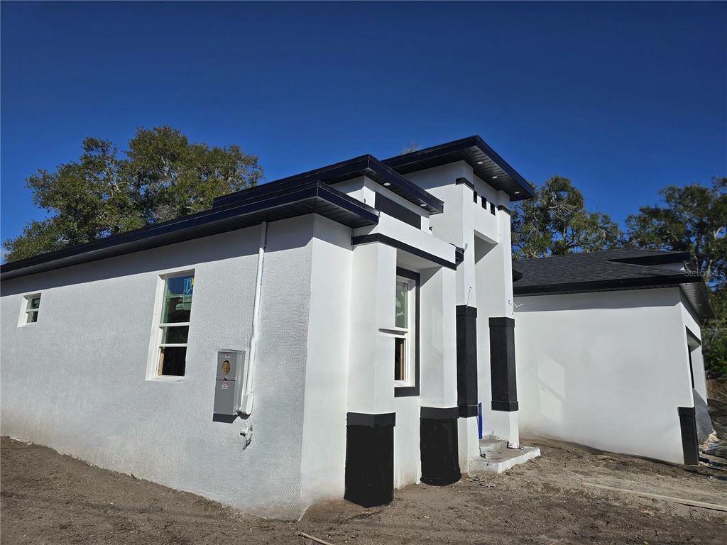 Photo of 912 Grand Central St, Clearwater, FL 33756 (MLS # TB8455968)