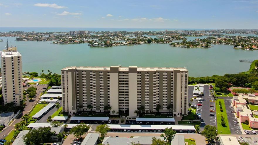 Welcome to this beautifully furnished 2BR/2BA condo, where every day feels like a vacation! Step onto your private balcony to take in breathtaking sunsets over Boca Ciega Bay and watch dolphins and manatees play right from your doorstep—Florida living at its best! This bright, open unit features a well-equipped kitchen with Corian countertops, a cozy dining nook, and an in-unit stackable washer/dryer for added convenience. The spacious primary suite is filled with natural light and includes a walk-in closet and private En-suite bath. Recent upgrades include a brand-new AC (2025), hurricane-impact windows and sliding doors, and freshly trimmed trees that open up even more gorgeous water views. You’ll also appreciate the assigned covered parking, same-floor storage, and the peace of mind that comes with a well-maintained, access-controlled building. Resort-style amenities await—take a dip in the heated pool or spa, unwind in the sauna or steam room, stay active in the fully equipped fitness center, or enjoy a friendly game of billiards or ping pong. Love the water? On-site kayak launches and storage make it easy to explore the bay. Ideally located just minutes from John’s Pass Village, award-winning beaches, Galatea Garden, and downtown St. Pete, you’ll have endless dining, shopping, and entertainment options at your fingertips. With a clubhouse, library, event space, and no age restrictions, Chateau Tower perfectly blends convenience, community, and coastal charm. Don’t miss this opportunity—schedule your private showing today and start living the Florida lifestyle you’ve always dreamed of!