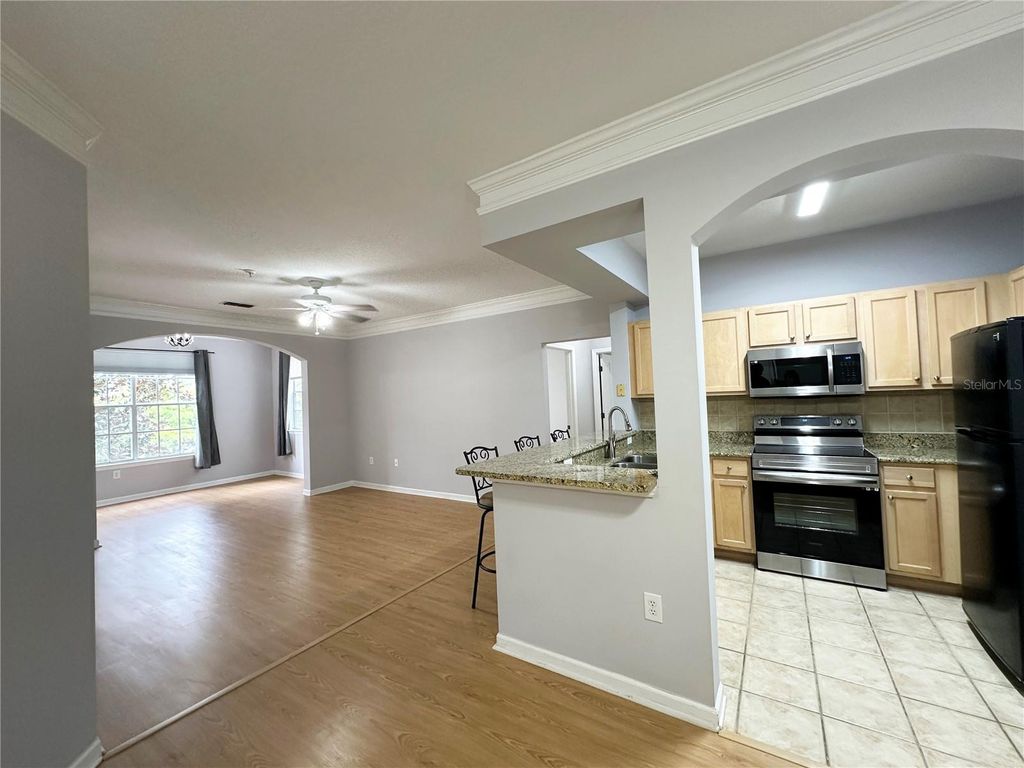 Photo of 12843 Madison Pointe Circle E #201, Orlando, FL 32821 (MLS # O6350594)