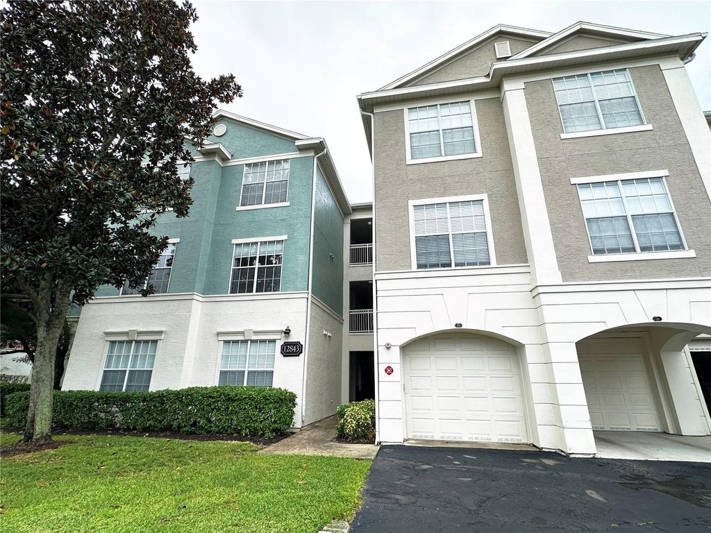Photo of 12843 Madison Pointe Circle E #201, Orlando, FL 32821 (MLS # O6350594)
