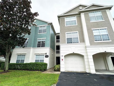 Photo of 12843 Madison Pointe Circle E #201, Orlando, FL 32821 (MLS # O6350594) Photo of 12843 Madison Pointe Circle E #201, Orlando, FL 32821 (MLS # O6350594)