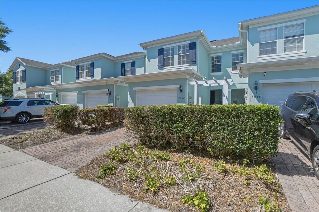 Photo of 3028 Capri Isle Way, Orlando, FL 32835 (MLS # O6406454)