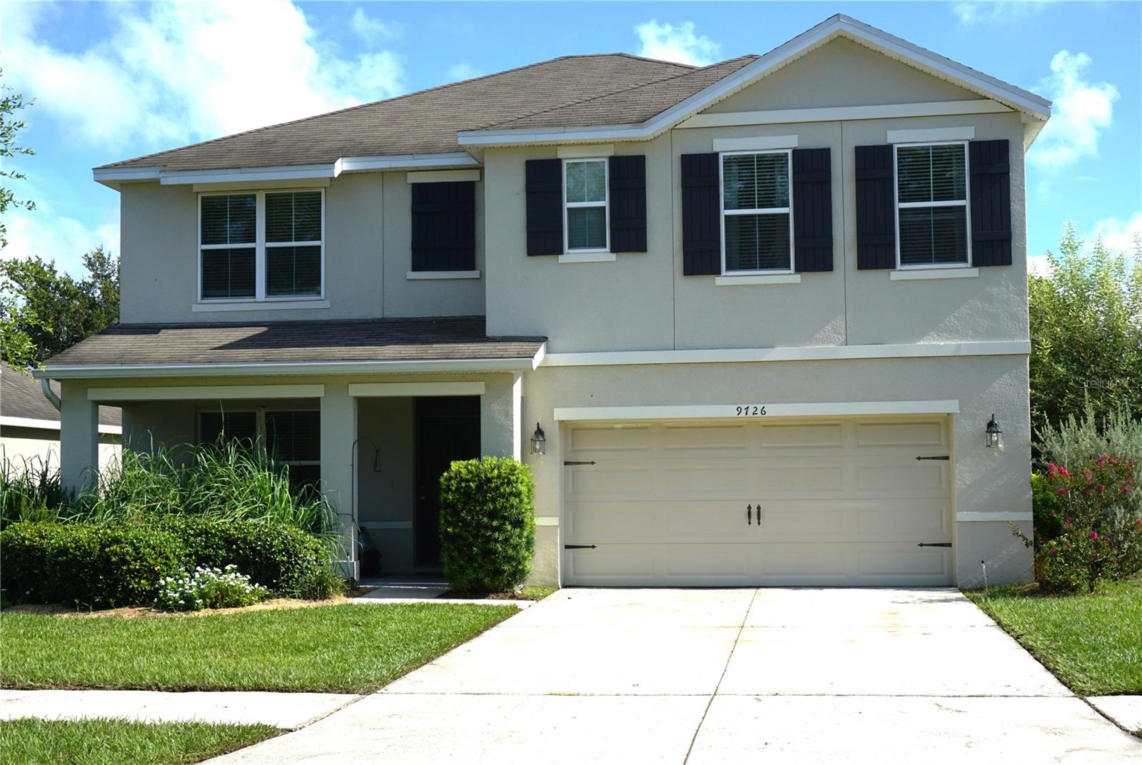 ***DON’T MISS THIS BEAUTIFUL 5-BEDROOM, 3-BATHROOM HOME*** located in the private gated community of Grand Oak Glen in Thonotosassa. Upon entering the foyer, you will notice the room on your left, which offers tremendous flexibility. It can serve as a formal living room, dining room, or office. As you continue down the hallway, you will appreciate the openness of the large family room with beautiful luxury vinyl plank flooring and an eat-in kitchen featuring ceramic tile floors, granite countertops, and a convenient breakfast bar. The eating area has sliding glass doors that open to the patio. The first floor also offers a bedroom with an adjacent full bath. Upstairs, you will find that all the bedrooms and the loft area feature beautiful, engineered hardwood flooring. The bathrooms all have ceramic tile floors. The spacious master bedroom is a delight. It features an en-suite bathroom with separate his and her sinks, a step-in shower, and his and her closets. There are three additional bedrooms on this level as well as a bathroom with dual sinks and a tub/shower combination. The laundry room is conveniently located on this level, so there is no hauling laundry up and down the stairs. There is also a great loft area on this level that can be used for a secondary family room or a play/study space. The backyard is large, allowing plenty of room for fun and entertaining. This home is situated across the street from a large green space that offers the community both openness and separation. The community has its private pool that includes seating for lounging in the sun or relaxing in the shade, surrounded by beautiful landscaping.