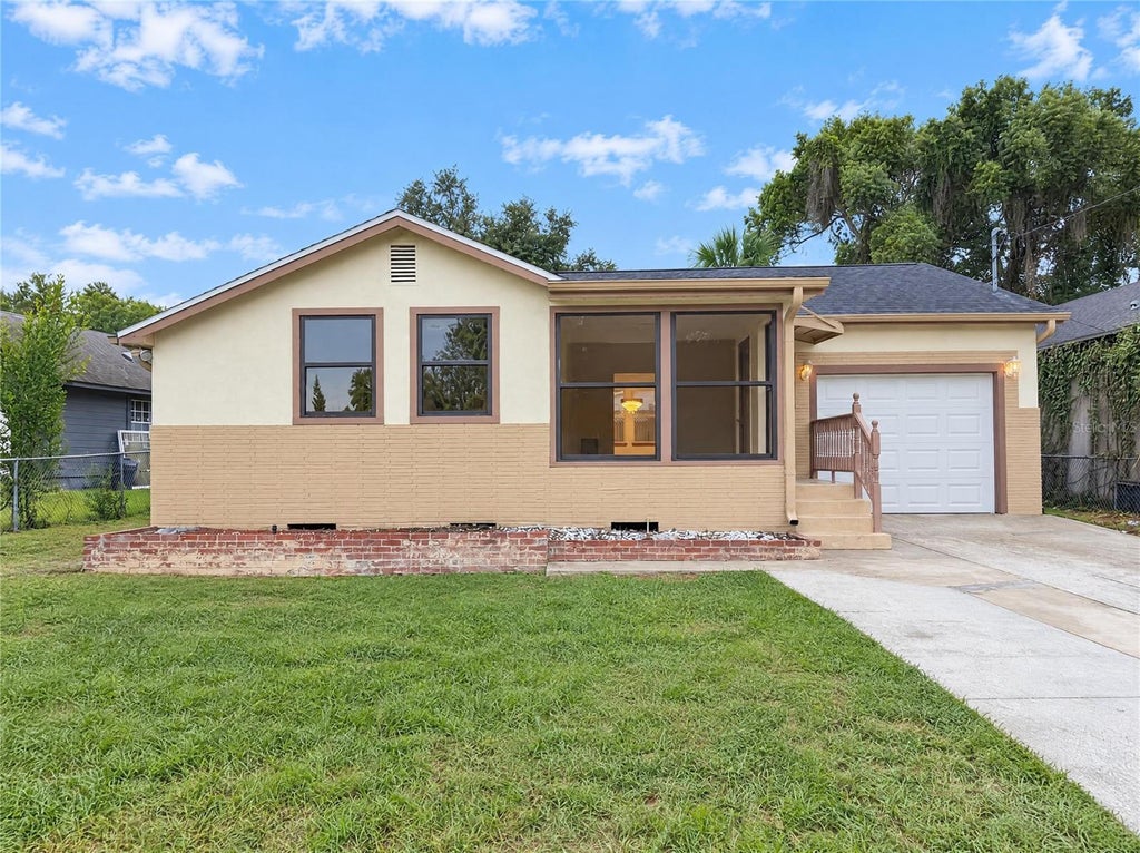 Photo of 1713 Hillside Drive, Tampa, FL 33610 (MLS # O6453891)