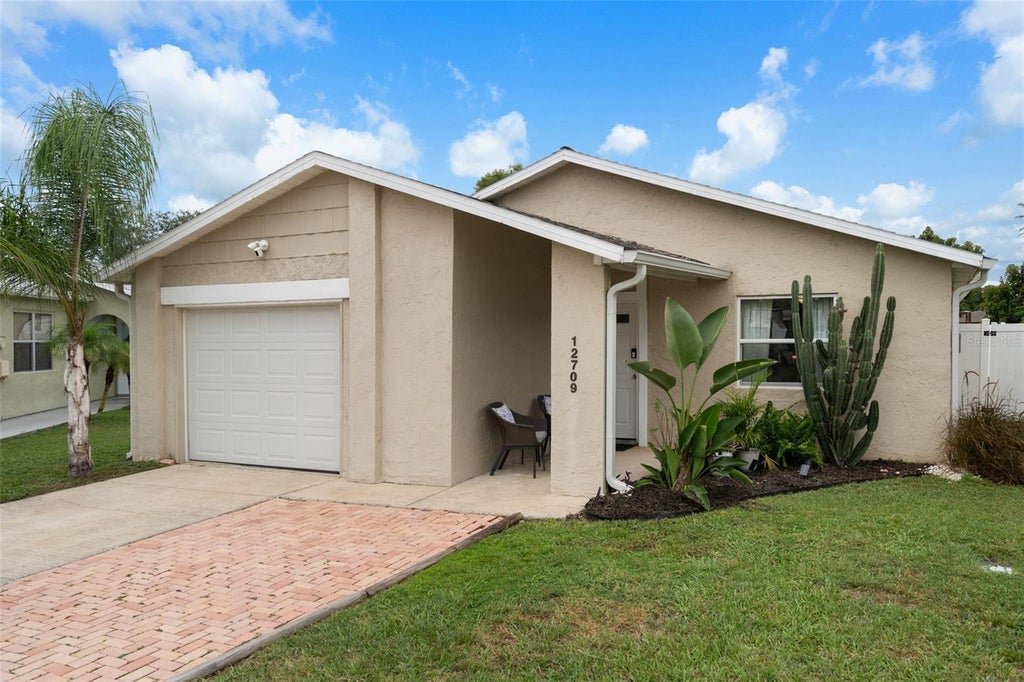 Photo of 12709 Skipper Lane, Hudson, FL 34669 (MLS # W7889844)