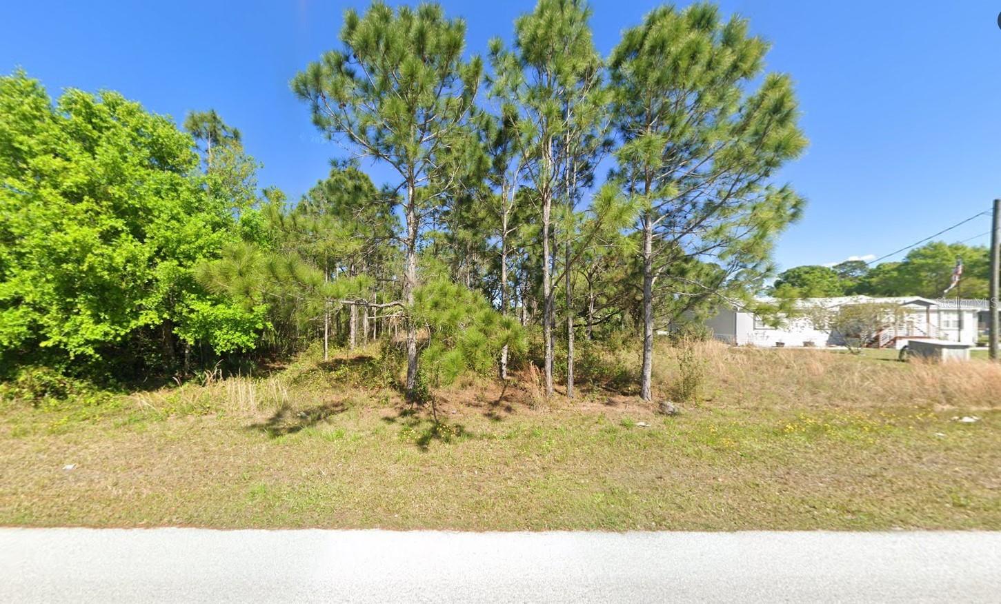 Build or bring your dream home on this 0.70 acre lot in Tall Pines Estates. Tall Pines Estates is a tranquil, residential neighborhood located on the east side of Okeechobee. Conveniently situated near schools, shopping, parks, and major roadways, this parcel combines quiet suburban living with easy access to local amenities. Whether you’re dreaming of building a custom home with plenty of outdoor space or making a smart investment, this spacious lot offers flexibility and value.