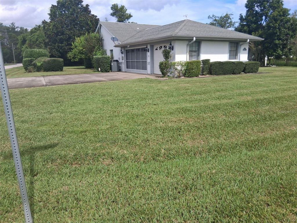 Photo of 14 Fernmill Lane, Palm Coast, FL 32137 (MLS # FC313509)