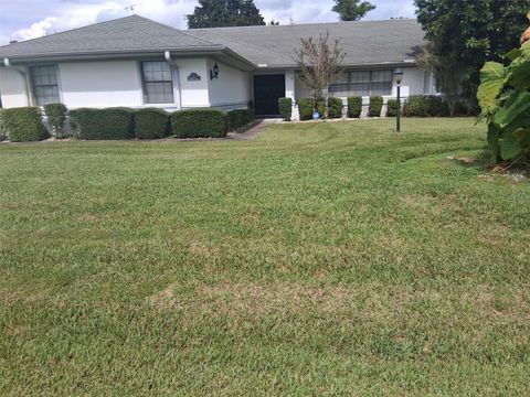 Photo of 14 Fernmill Lane, Palm Coast, FL 32137 (MLS # FC313509)