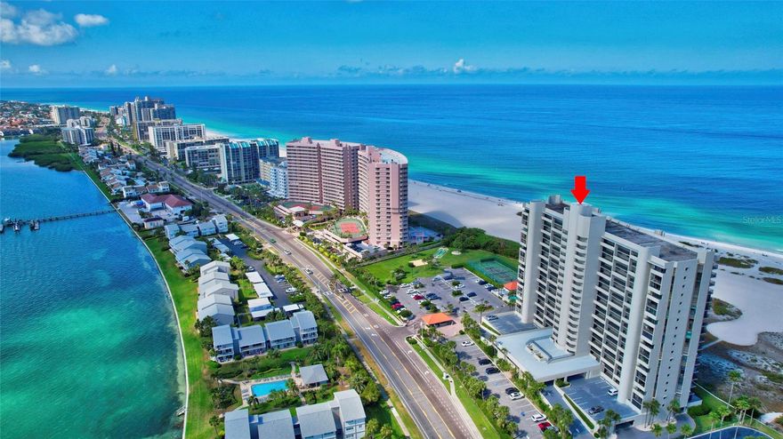 Lighthouse Towers offers the ultimate Sand Key lifestyle with resort-style amenities and direct beach access. Residents enjoy a relaxing outdoor cabana area ideal for grilling and entertaining beside the heated pool and spa, along with tennis, pickleball, basketball, and shuffleboard courts. A convenient walking trail leads straight to the beach, and on-site management plus a 24-hour manned gate provide exceptional privacy and security. This **fully furnished** 1 Bedroom 1 1/2 bath unit has spectacular views of the beach and is located in one of only two buildings on Sand Key that allow minimum **2-week rentals**, making it an excellent option for both personal enjoyment and strong rental income potential.  The kitchen has stainless steel appliances including a stove with double oven and more. A private storage closet is located on the same floor as the unit, and the community also offers shared storage for bikes and kayaks—perfect for active coastal living. Positioned within an exclusive guard-gated community, the property combines security with true resort convenience. Its prime location provides easy access to Tampa International  and  Clearwater- St. Pete Airports, as well as nearby dining, shopping, cultural attractions, and the vibrant offerings of Clearwater Beach and St. Petersburg. Whether you’re seeking a serene beachfront retreat or a high-performing investment property, this fully furnished unit delivers an exceptional blend of lifestyle, convenience, and value.