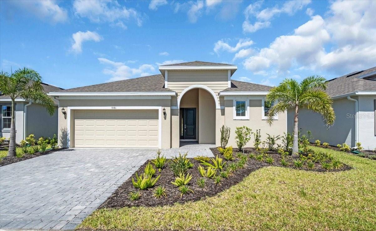 Discover Brighton, a premier new home community ideally situated on Jacaranda Blvd near Center Road, offering unmatched convenience in beautiful Venice, Florida. Enjoy close proximity to shopping, dining, top-rated medical facilities, and the highly anticipated Sprouts Farmers Market currently under construction. With easy access to I-75, you're just a short drive from Sarasota, Tampa, and Fort Myers.
Only 5 miles from Venice’s stunning beaches and vibrant downtown, Brighton is also surrounded by award-winning golf courses, natural preserves, and tranquil water views. With low HOA fees, this community offers the perfect balance of affordability and lifestyle.
This featured home, the Walton floor plan, boasts a thoughtfully designed open-concept layout ideal for modern living. The spacious kitchen includes generous counter space, a large walk-in pantry, and a central island overlooking the family room—perfect for gathering with family and friends. Architectural details such as tray ceilings in the primary bedroom, dining area, and family room add volume and character.
Additional highlights include a large mudroom with a drop zone, a conveniently located laundry room with a utility sink, and plenty of storage throughout.
Don’t miss this incredible opportunity to own a beautifully crafted home in one of Venice’s most desirable new communities. Schedule your tour today and make Brighton your home!