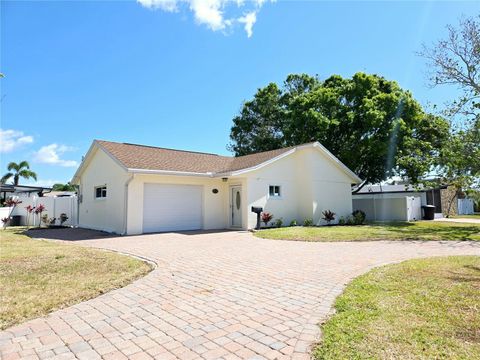 Photo of 8719 Sunlit Cove Drive NE, St Petersburg, FL 33702 (MLS # TB8373891)