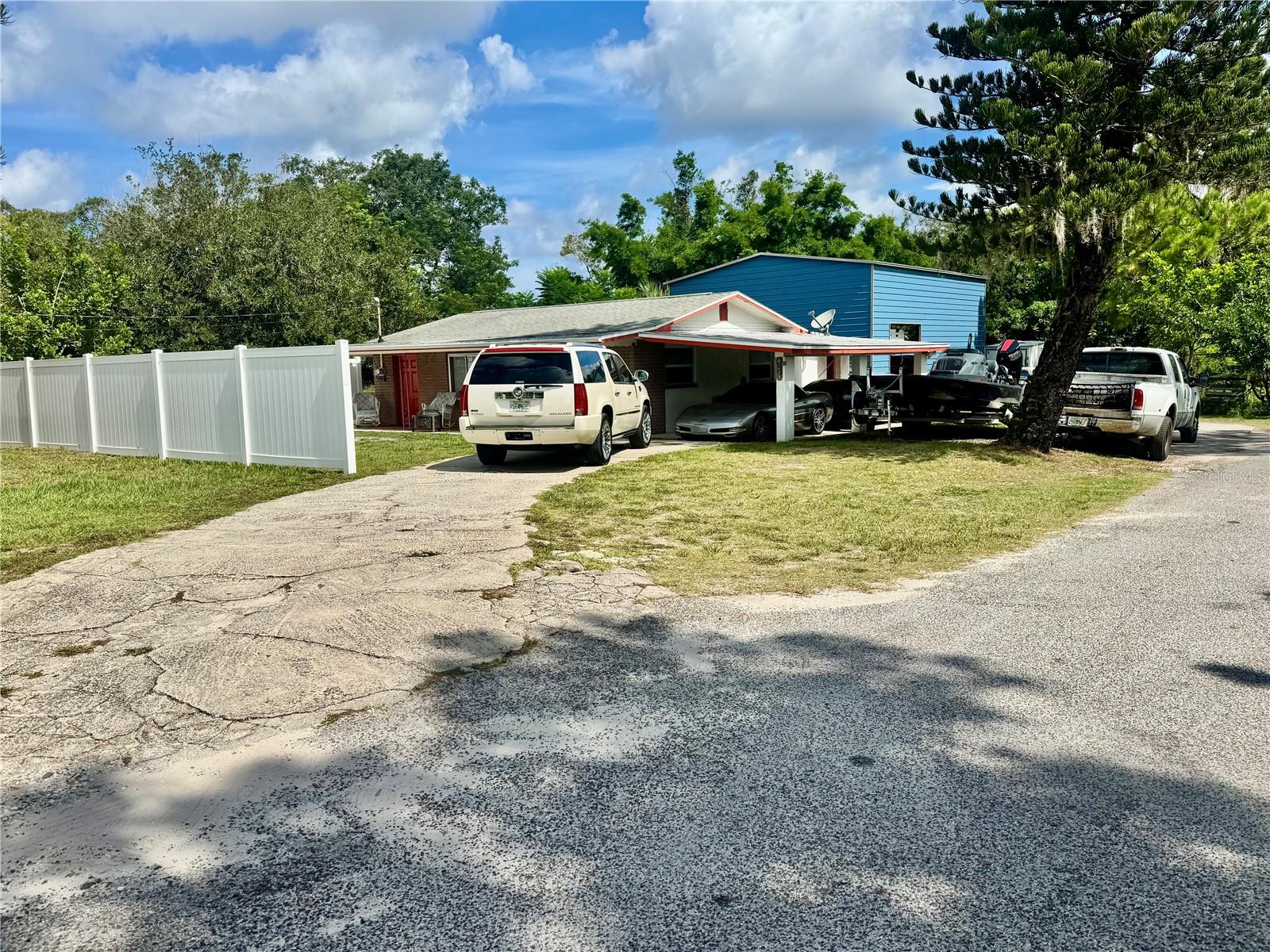 Live and Work on Site! Versatile Commercial Property with Home, Office, and Workshop Don’t miss this unique opportunity to own a mixed-use property zoned C2 and R1, perfectly suited for entrepreneurs looking to live and operate a business on-site. Situated on a spacious ½ acre lot just behind Home Depot, this property offers incredible visibility and convenience. The property features a completely renovated 2-bedroom, 1.5 -bath home with modern finishes throughout and includes a large office space—ideal for running a business from home. A brand-new roof is also being installed for added peace of mind. A detached metal workshop with two roll-up bay doors provides ample space for auto service, storage, or other commercial uses. Currently operating as an auto sales and service business, this site is ready for your next venture. Bonus: generate additional income through on-site storage rentals!