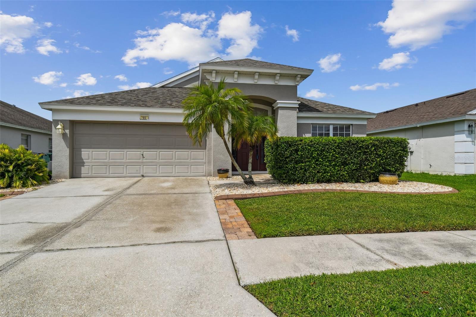 POOL HOME – LOW HOA, NO CDD! Welcome to this 4 bedroom, 2 bath pool home in the highly desirable community of Palm Cove. Offering the perfect blend of comfort and convenience, this home is ideal for anyone looking to enjoy the best of Florida living. As you step inside, you’re greeted by a light and bright living/dining room combination. The spacious kitchen with newer appliances, seamlessly connects the living space – creating a central hub perfect for entertaining or everyday living. The primary suite is a private retreat with large walk-in closet and en-suite bath featuring dual sinks, shower and garden tub. A split-bedroom layout ensures privacy for guests or family members. Large sliding doors from the family room open to an expansive screened-in lanai, offering a seamless indoor-outdoor flow. Enjoy evenings outdoors or unwind in your own heated sparkling pool. Recent updates deliver peace of mind, including new ROOF in April 2025 as well as pool pump in 2024. Located minutes from schools, shopping, dining, and major highways (I75, SR54).