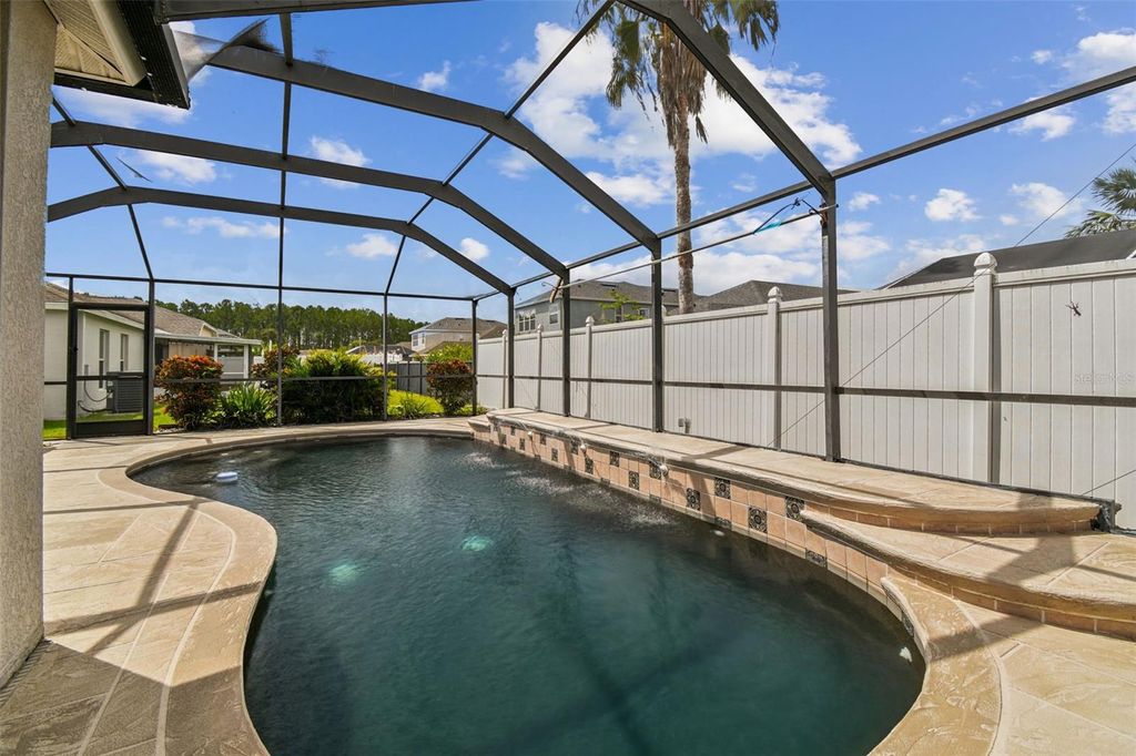 Photo of 7653 Outerbridge Street, Wesley Chapel, FL 33545 (MLS # TB8416239)