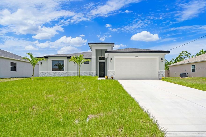 Luxurious New Construction with Private Guest Suite! 4BR/3BA showcasing quality at every turn. Seller offering $10,000 in Buyer Incentives! Enjoy IMPACT windows & doors and wood-look porcelain tile throughout, soaring 9'4'' ceilings, and 8' interior doors. The chef's kitchen features a waterfall quartz island, pendant lighting, ceiling-height soft-close cabinetry, pull-out spice rack & hidden trash bin, exterior vented hood and premium LG appliances. The spacious guest suite lives like a second primary with its own entrance, kitchenette, and full bath—perfect for multi-generational living. The primary suite offers a spa-like retreat with soaking tub, walk-in shower, dual vanities, and large walk-in closet. Entertain in the open living/dining area that flows to a covered patio pre-plumbed for a summer kitchen. Complete with fixtures, smart fans, smart garage door, water treatment system, laundry room w/ sink, and 1-year builder warranty and 10 year structural. Located on a quiet street, only minutes from Bayside Lakes area and close to a shopping center that features Public and restaurants.
Ask about NO CLOSING COST loan with preferred lender!