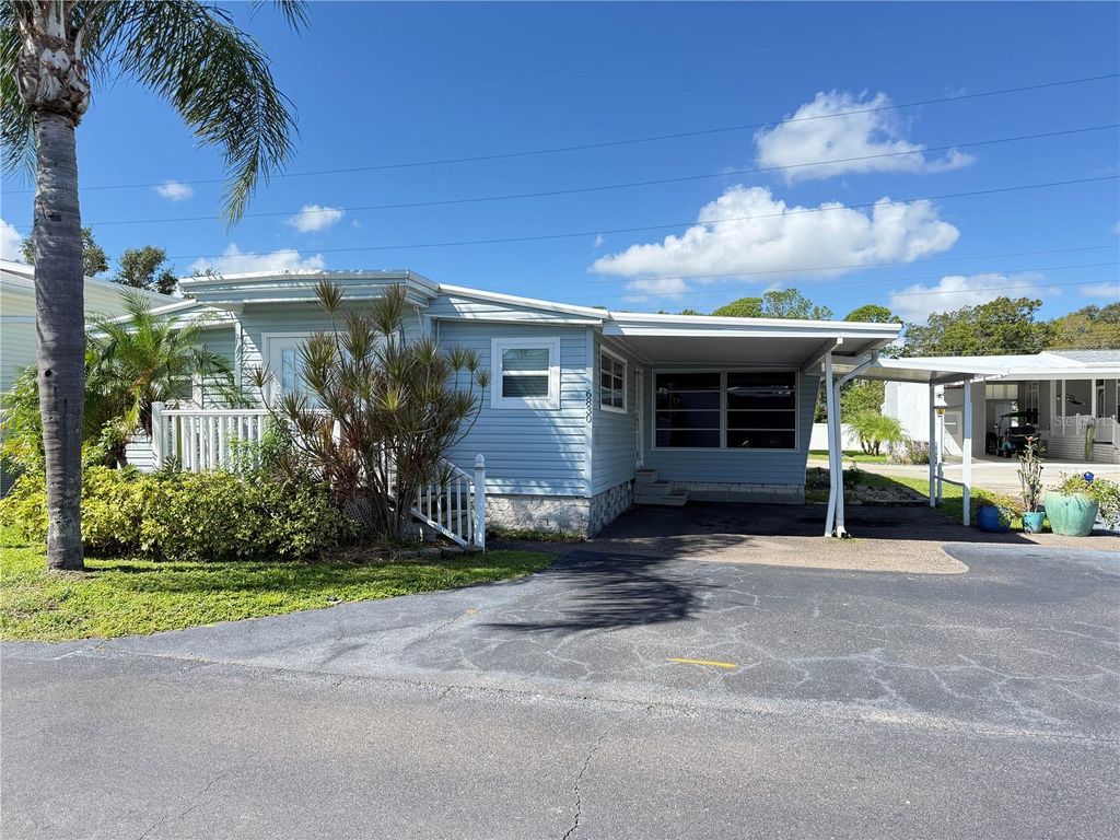 Photo of 6830 Americana Drive NE #127, St Petersburg, FL 33702 (MLS # TB8435944)