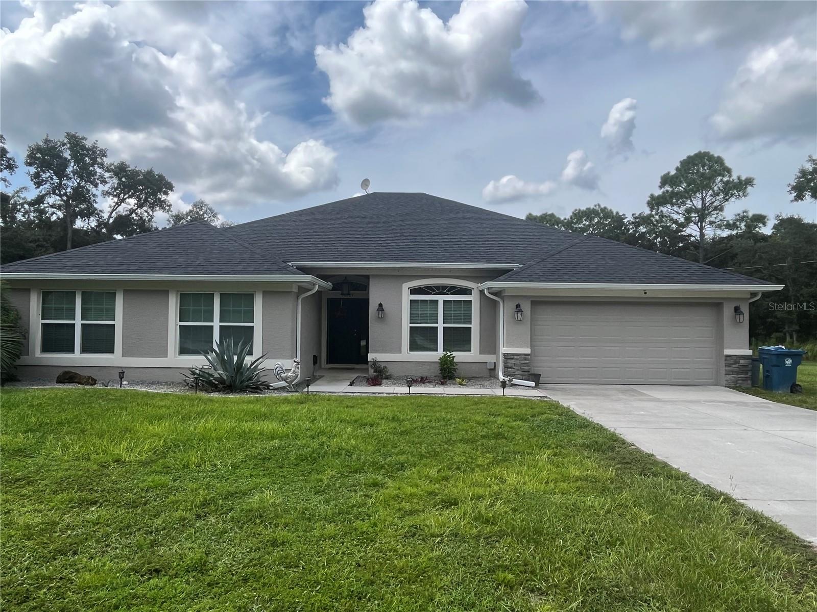 MUST SEE ! Beautiful 3000 sq ft POOL HOME ! Country Charm but still close to everything you need. As you drive up this gorgeous property sits on 1.3 Acres of land. Built in 2019 this home features 5 bedroom 3 full baths and is the perfect open concept layout for the whole family. The custom stone TV wall in the family room has built in surround sound and a LED Fireplace! The home features gorgeous luxury laminate flooring throughout the main living areas, tile in the wet areas and carpet in the bedrooms. The master is a great space with two walk in closets a garden tub and walk in shower. The other 4 bedrooms are all perfect sizes . Step outside to the beautiful irrigated landscaping with a brand new pool. Bring all your toys to enjoy the great outdoors. Only minutes away from the new Sandal Key Lagoon, Weeki Wachee Springs and Crystal River. Schedule your showing now before it's to late!