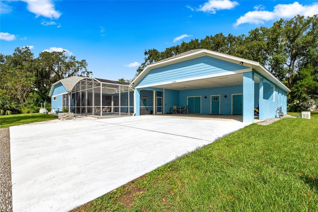 Photo of 2700 Westside Drive, Leesburg, FL 34748 (MLS # OM711251)