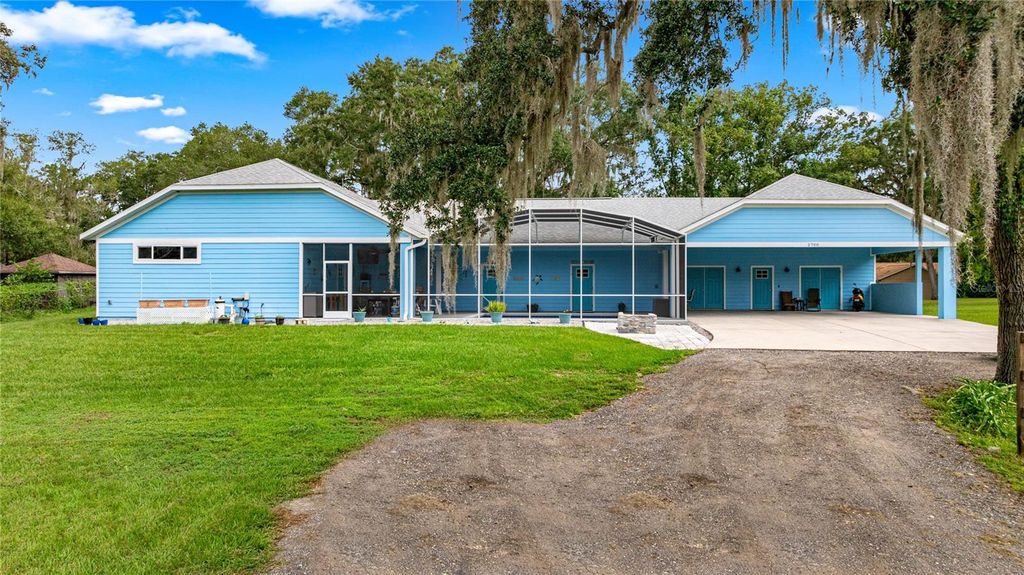 Photo of 2700 Westside Drive, Leesburg, FL 34748 (MLS # OM711251)