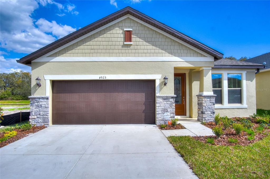 Photo of 4923 Rolling Green Drive, Wesley Chapel, FL 33543 (MLS # TB8494995)