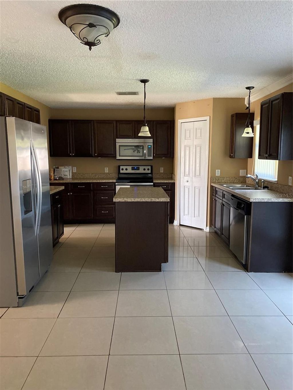 Photo of 1994 Peridot Circle, Kissimmee, FL 34743 (MLS # O6355908)