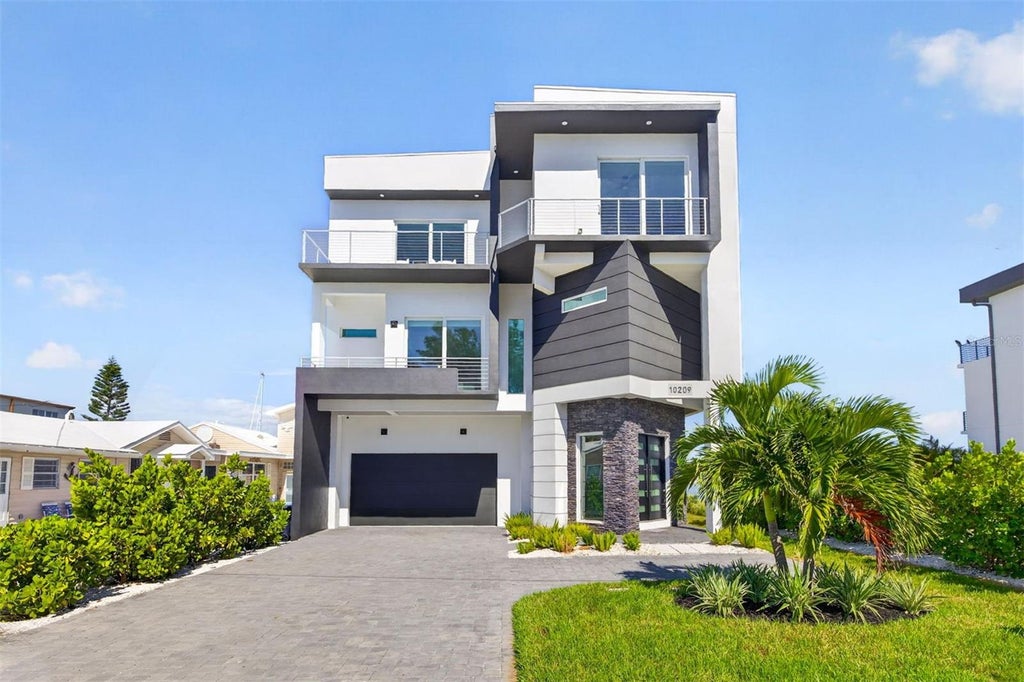 Photo of 10209 Gulf Boulevard, Treasure Island, FL 33706 (MLS # TB8551074)