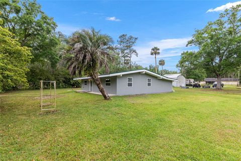 Photo of 11065 NE 42nd Street, Silver Springs, FL 34488 (MLS # OM699934) Photo of 11065 NE 42nd Street, Silver Springs, FL 34488 (MLS # OM699934)