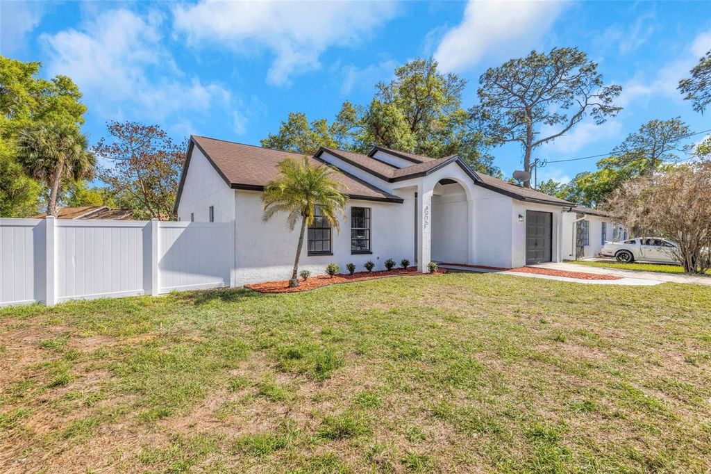 Photo of 8315 N Temple Place, Tampa, FL 33617 (MLS # TB8488619)