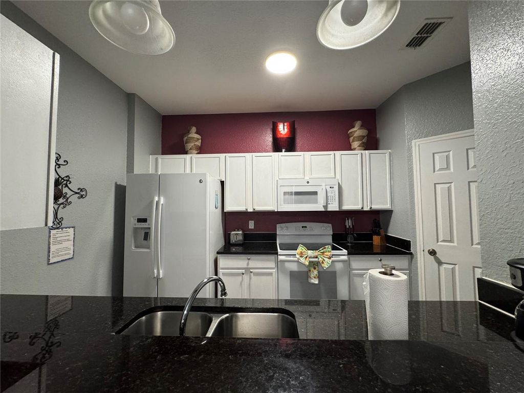 Photo of 2821 Almaton Loop #205, Kissimmee, FL 34747 (MLS # S5146674)