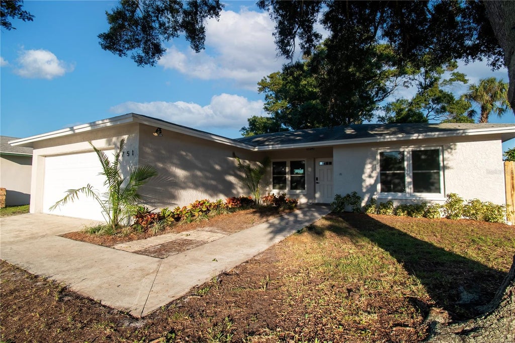 Photo of 5751 Dunfries Street N, St Petersburg, FL 33709 (MLS # TB8560546)