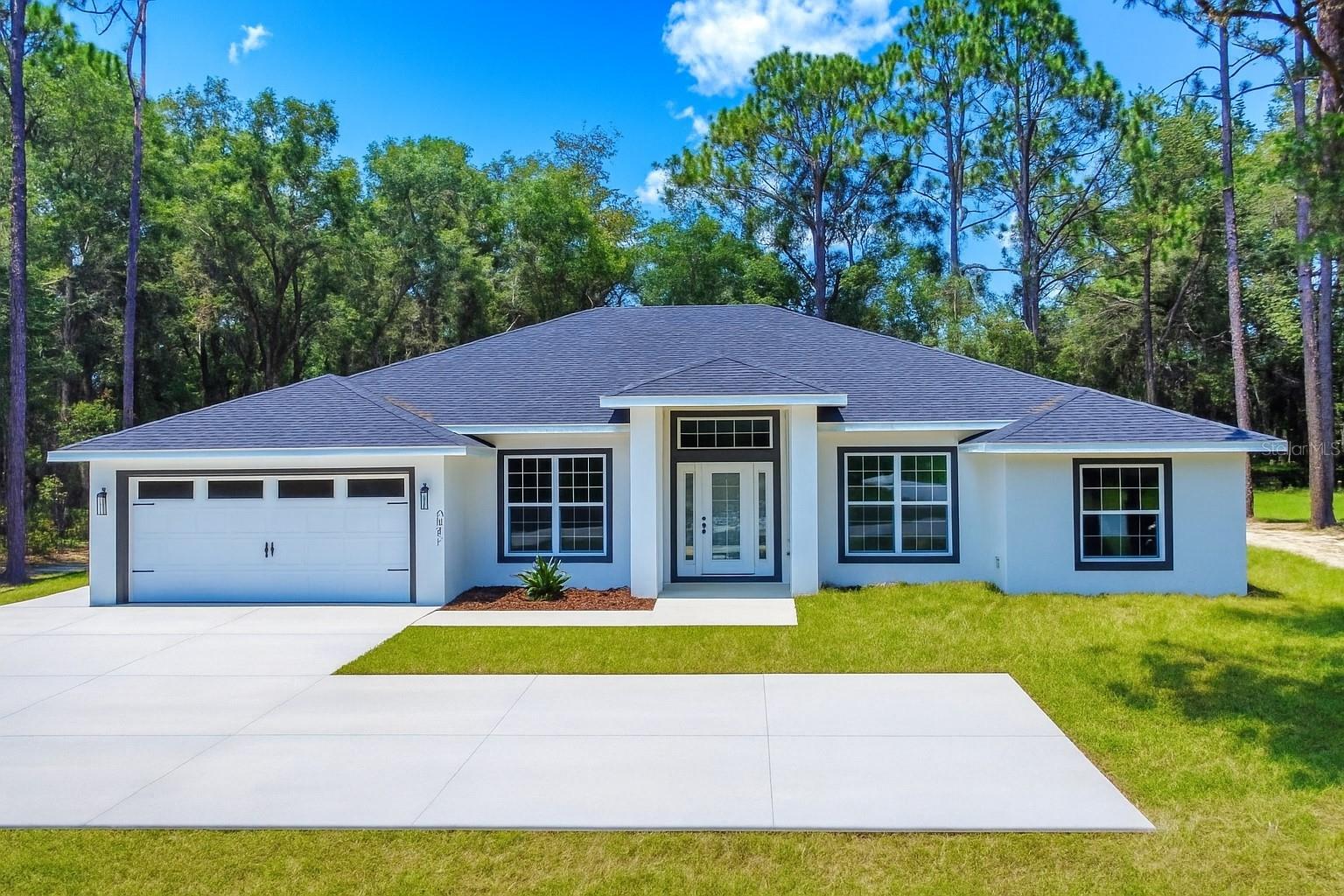 Modern Luxury Meets Florida Living – Brand New 5-Bedroom Pool Home on Oversized Lot. Welcome to your dream home! This stunning new construction masterpiece offers 5 spacious bedrooms and 3 luxurious full baths, all situated on an oversized lot that combines privacy with space to entertain — and best of all, no HOA fees! Step inside and be captivated by the open floor plan and modern design, thoughtfully crafted for both function and style. The chef’s kitchen is a true showstopper, featuring top-of-the-line Samsung appliances with a 5-year warranty, a deep farmhouse sink, upgraded faucets, soft-close cabinetry, solid surface countertops, and a generously sized walk-in pantry. Seamlessly transition from indoor to outdoor living with exterior pocket sliding doors that open to your personal backyard oasis. Relax year-round in the heated 12x24 pool nestled under an expansive 18x60 screened lanai, designed with both under-roof shade and full sun enjoyment. Whether you're hosting guests or enjoying peaceful family nights, this home offers the perfect blend of luxury, comfort, and convenience — without the burden of HOA restrictions or fees. Don’t miss your opportunity to own this exceptional property — schedule your private showing today!