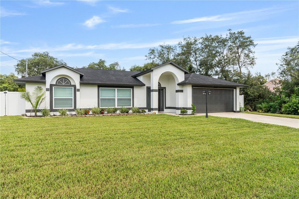 Photo of 2685 Groveland Avenue, Deltona, FL 32725 (MLS # O6448067)
