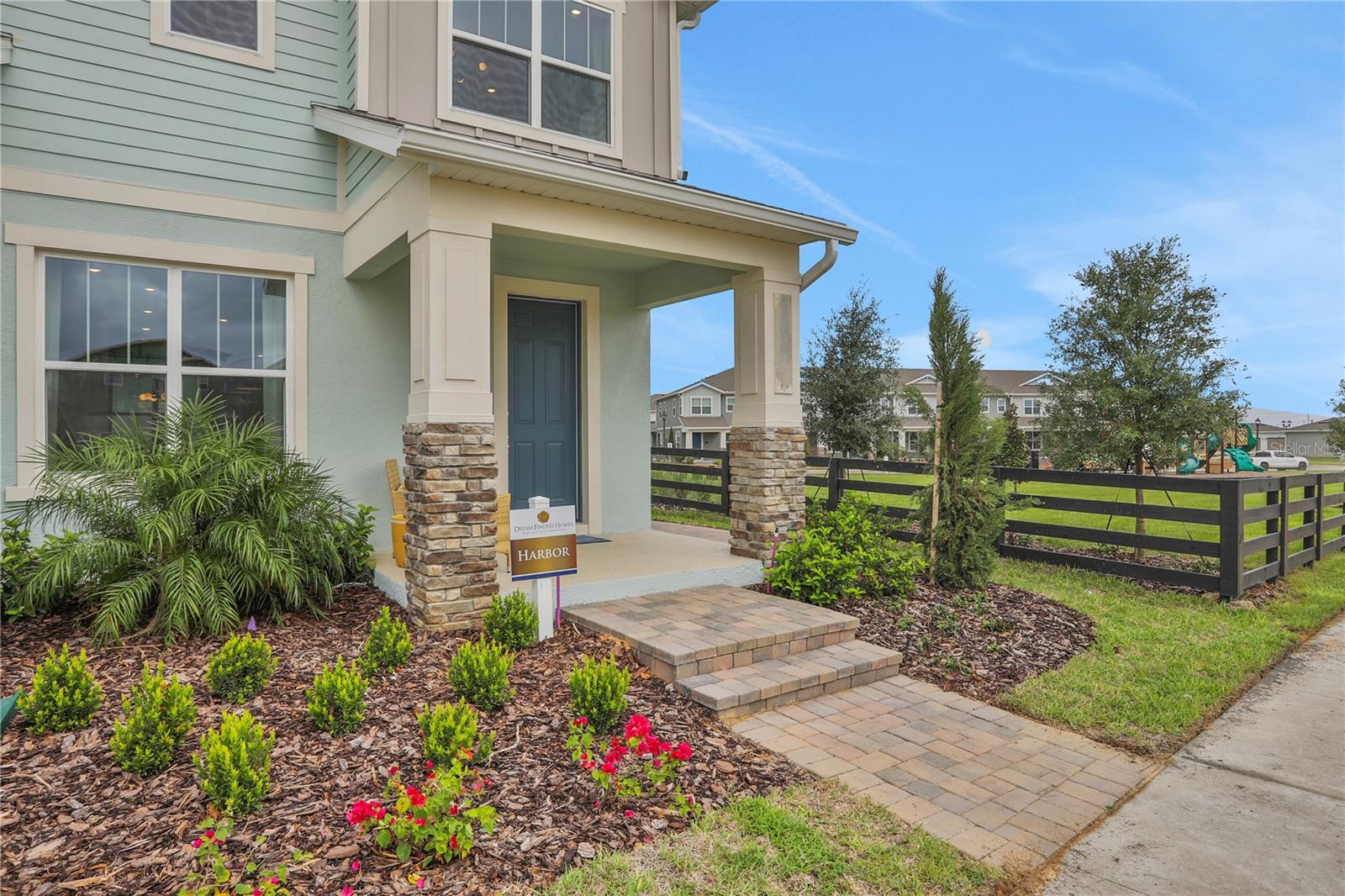 Investors, vacation home buyers, and first-time buyers, discover your ideal HORIZON WEST home at Hamlin Ridge! Filled with natural light and plenty of views, this FORMER MODEL, CORNER townhome offers 3 bedrooms and 2.5 bathrooms in a prime location. Perfectly situated at the front of the neighborhood and just a short walk from Hamlin Elementary and Hamlin Middle School, this NEVER LIVED IN 2024 residence offers quick access to Horizon West Hospital and the new Orlando College of Osteopathic Medicine (OCOM), Walmart, Publix, and a variety of dining options, making everyday errands a breeze. Built by Dream Finders—honored as the 2025 National Builder of the Year by Builder Magazine—this home comes with a ONE-YEAR builder's warranty, ensuring peace of mind for the new homeowner. Additional upgrades include custom window treatments, modern light fixtures, ceiling fans, and quartz countertops in the kitchen and bathrooms. The elegant kitchen also features upgraded matte-finished cabinets with under-cabinet lighting and pendant lights over the large eat-in breakfast island. The slat-wood accent wall and sleek ceiling fan add a touch of elegance in the adjoining living room. The primary bathroom boasts a large shower with floor-to-ceiling tile, a double-sink vanity, and a HUGE walk-in closet. From the welcoming covered front porch to the private back patio, you can also enjoy some outdoor space. As a former model, this property offers a unique feature: a convenient paver walkway from the garage to the front entrance, providing easy access and views to the nearby playground and picnic tables. Plus, quick access to the 429 expressway means Disney, downtown Orlando, the airport, and other attractions are just a short drive away. The monthly $225 HOA covers EXTERIOR PAINTING, ROOF REPLACEMENT, AND HIGH-SPEED INTERNET! Contact us today to schedule your private showing.