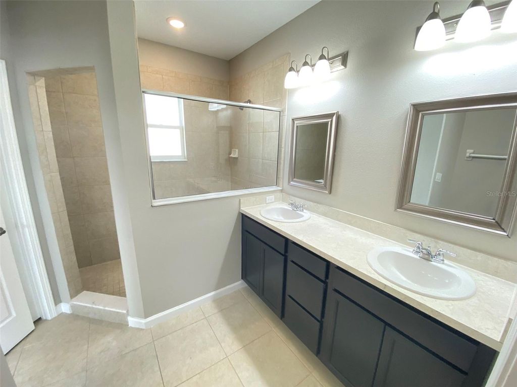 Photo of 258 Bella Prestwick Boulevard, Davenport, FL 33837 (MLS # O6370999)