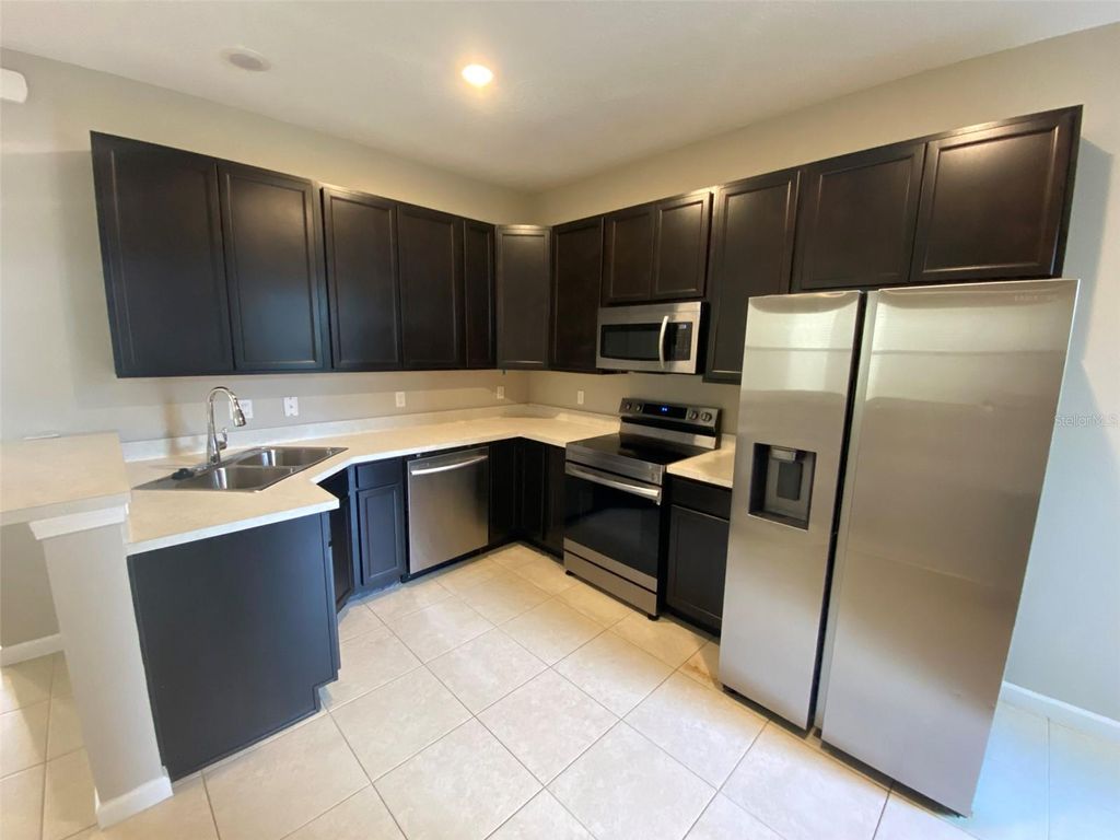 Photo of 258 Bella Prestwick Boulevard, Davenport, FL 33837 (MLS # O6370999)