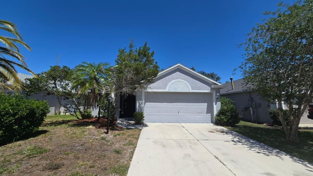 Photo of 12026 Winding Woods Way, Lakewood Ranch, FL 34202 (MLS # TB8503573)