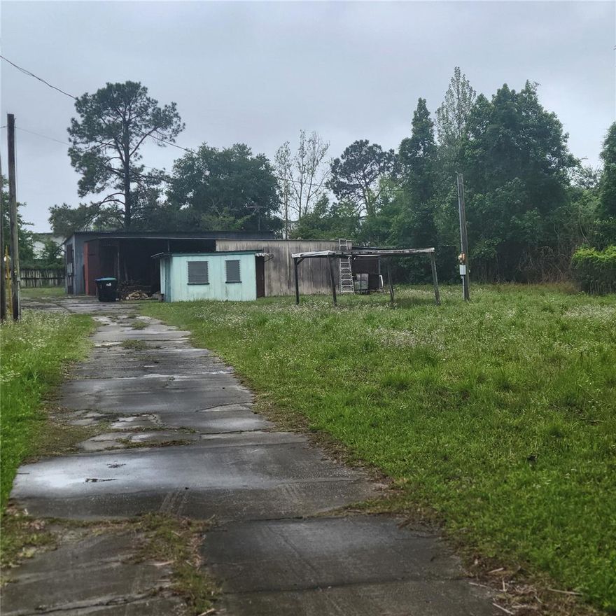 1.77 Acres on Ind - 4 property available.  This Industrial property has an additional parcel Zoned A-1 totaling 3.5 +- acres total land.  Home and buildings are in poor condition.  520 +- feet of frontage on Apopka Blvd.