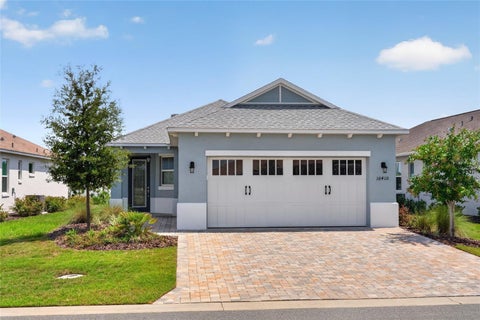 Photo of 10410 SW 96th Loop, Ocala, FL 34481 (MLS # OM729524)