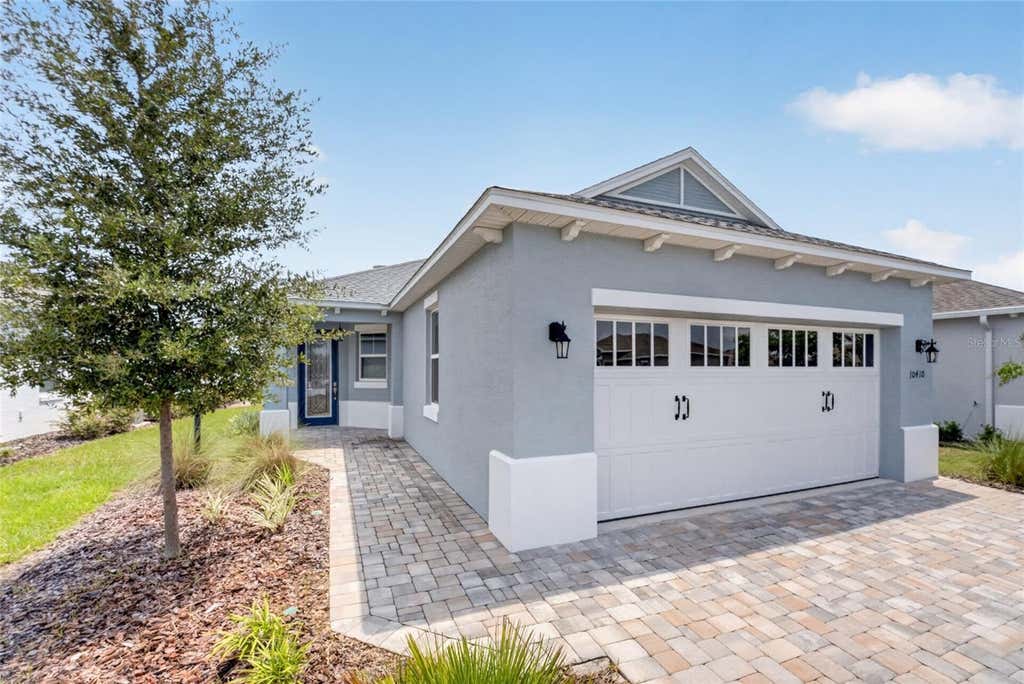 Photo of 10410 SW 96th Loop, Ocala, FL 34481 (MLS # OM729524)