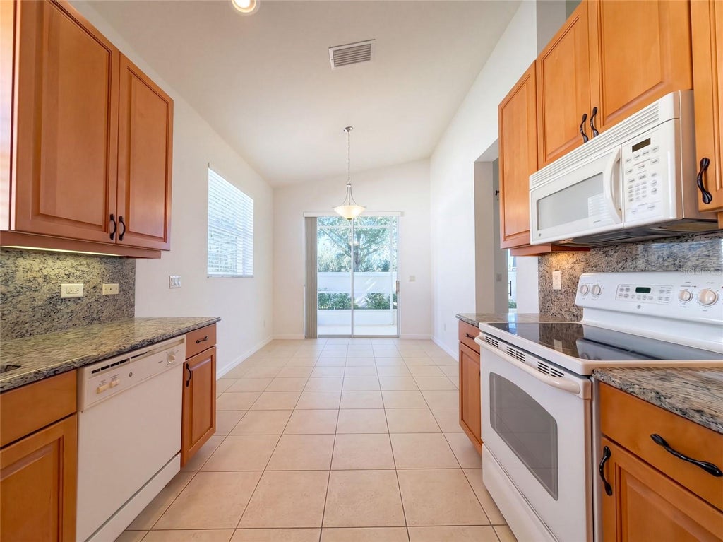 Photo of 4223 63rd Terrace E, Sarasota, FL 34243 (MLS # O6444685)